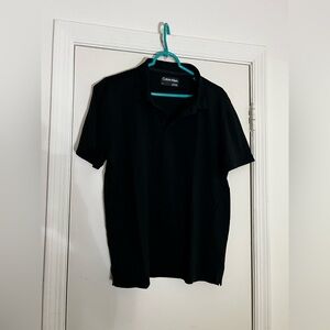 Calvin Klein Black Polo Short Sleeve
Size Large
In great condition